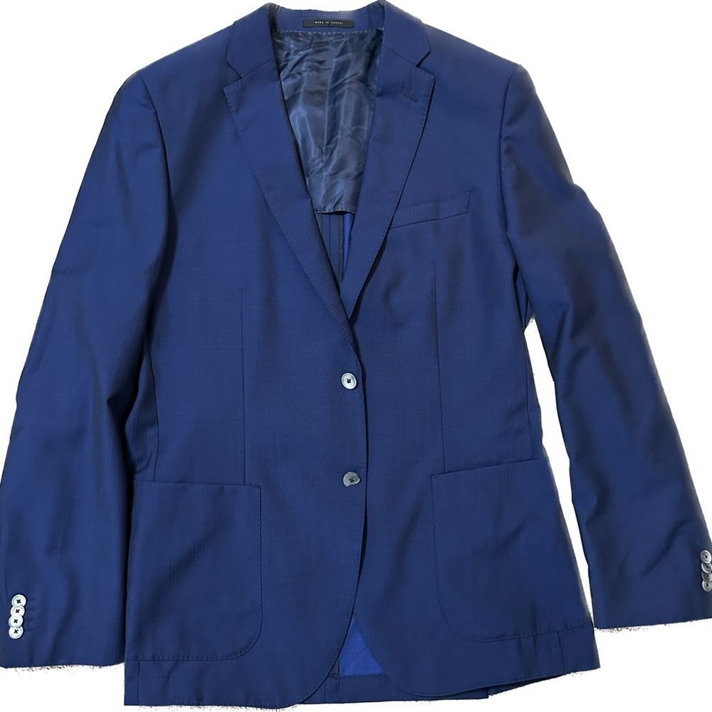 Hugo Boss Blue Suit with Shell buttons. Light weight Super 110’s Virgin Wool